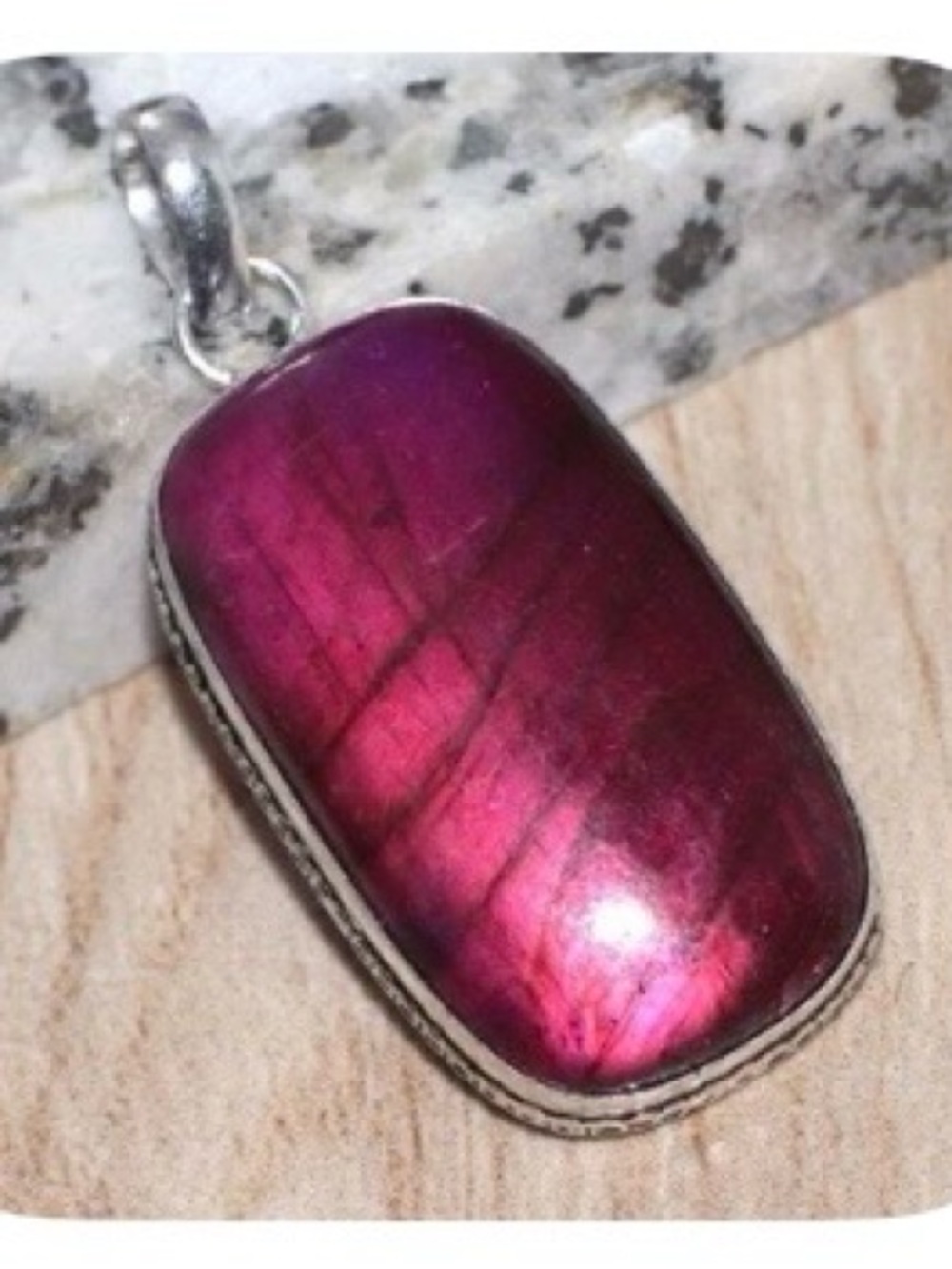 Color-treated Pink Flash Labradorite Pendant in 925 silver